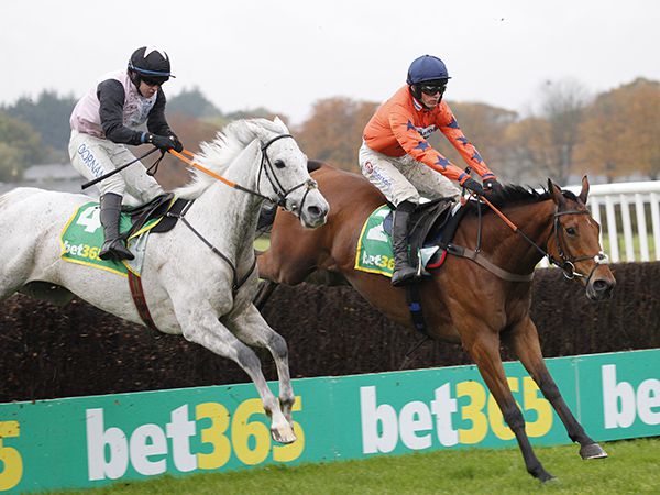Cheltenham graduates GENTLEMANSGAME and BRAVEMANSGAME finish first and second in the Grade 2 Charlie Hall Chase